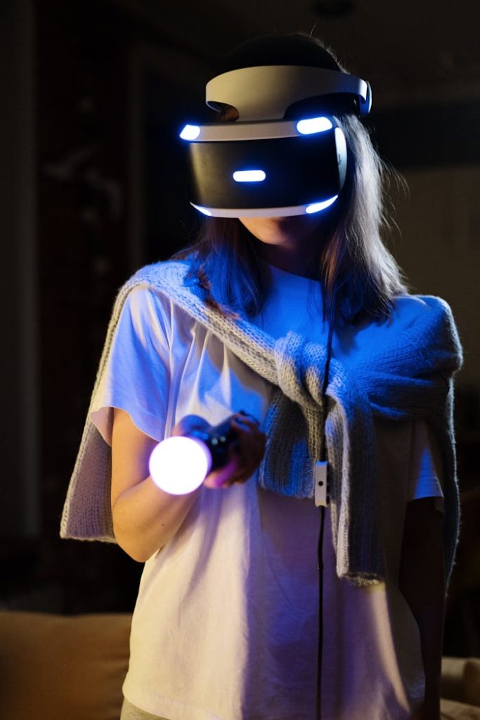 hands-woman-girl-evening-4009623 Woman enjoying a virtual reality gaming session with VR headset and controller.